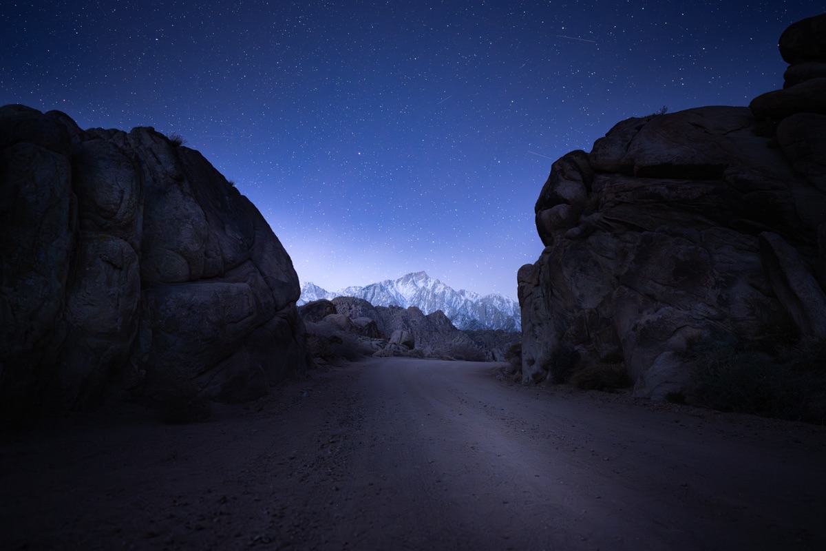 Starry night sky over the Sierra peaks at Alabama Hills