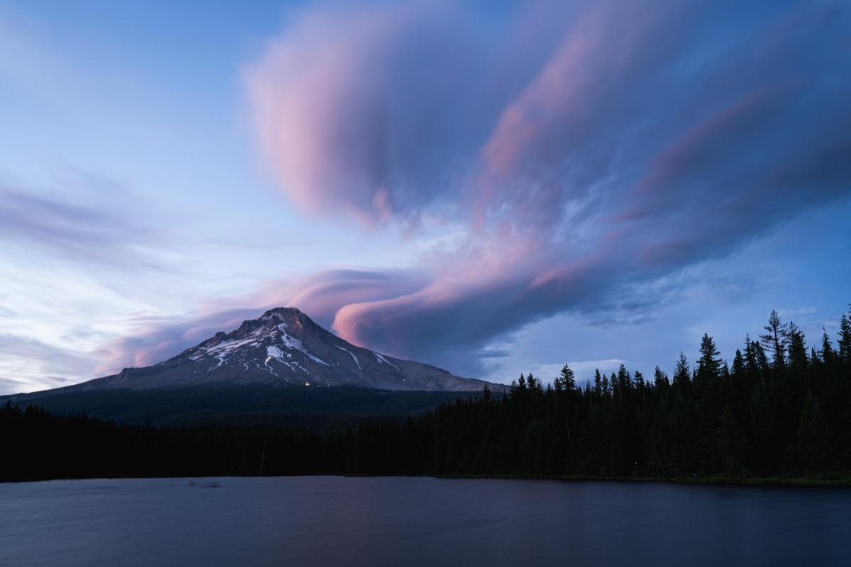 Pink lenticular clouds over Mount Hood at Trillium Lake